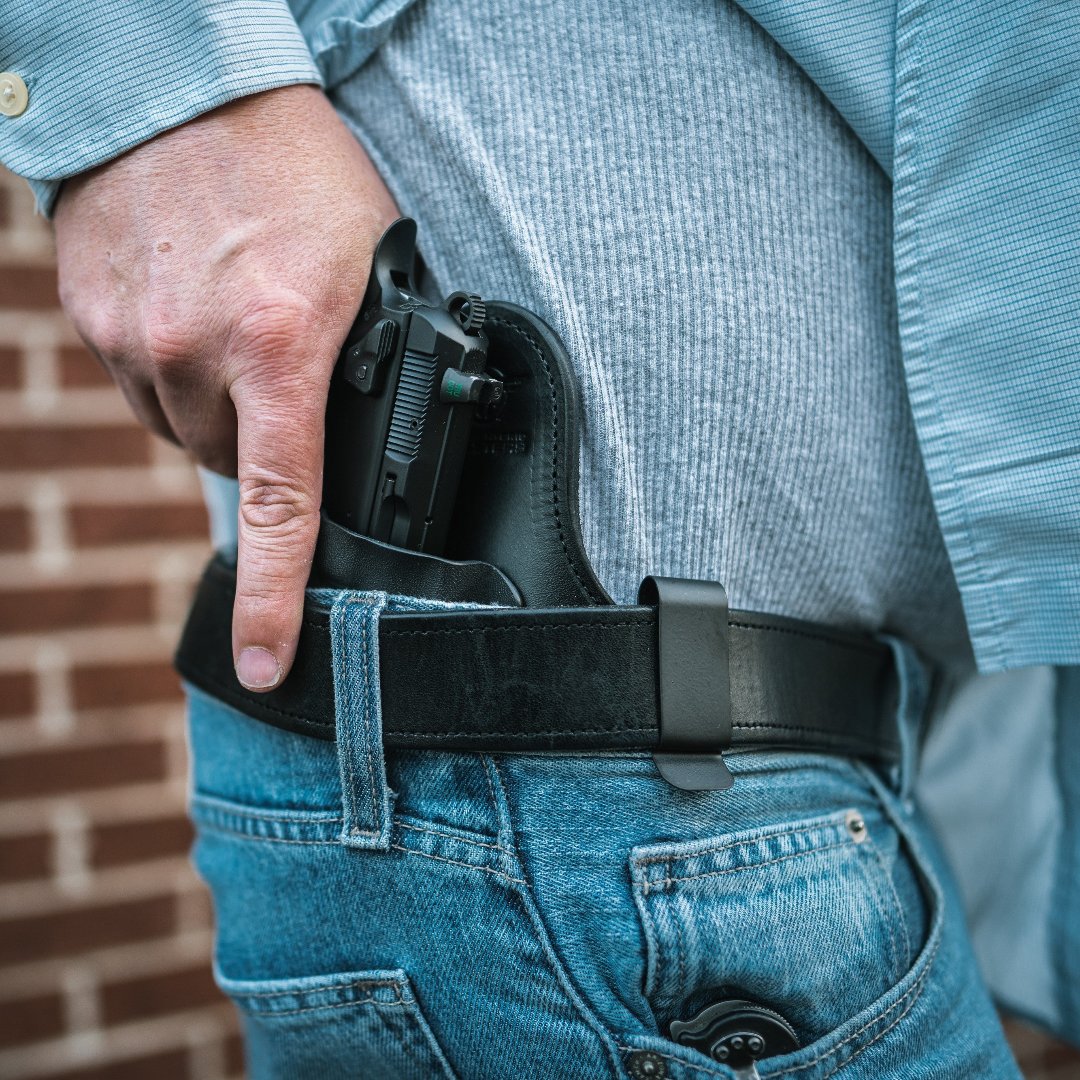 Hidden Hybrid Holsters Inside the Waist Double clip holster inside the pants on man in jeans